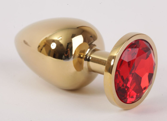 Золотистая анальная пробка с красным кристаллом - 8,2 см. Золотистая анальная пробка с красным кристаллом - 8,2 см.