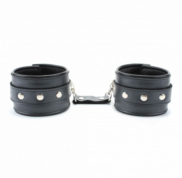 Черные кожаные наручники с металлическими клепками Черные кожаные наручники с металлическими клепками