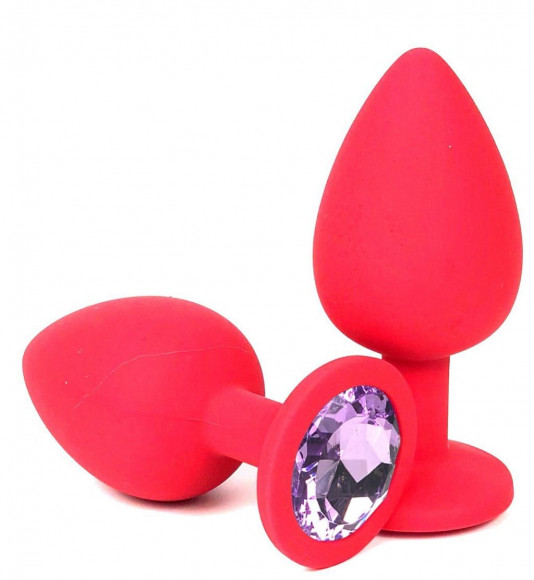 Розовая силиконовая пробка с сиреневым кристаллом - 9,5 см. Розовая силиконовая пробка с сиреневым кристаллом - 9,5 см.