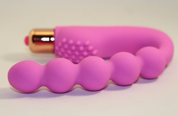 Розовый силиконовый вибромассажер в форме подковы Розовый силиконовый вибромассажер в форме подковы