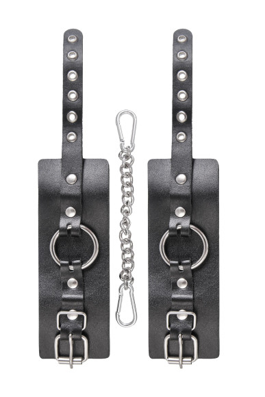 Черные наручники из толстой натуральной кожи с люверсами Черные наручники из толстой натуральной кожи с люверсами