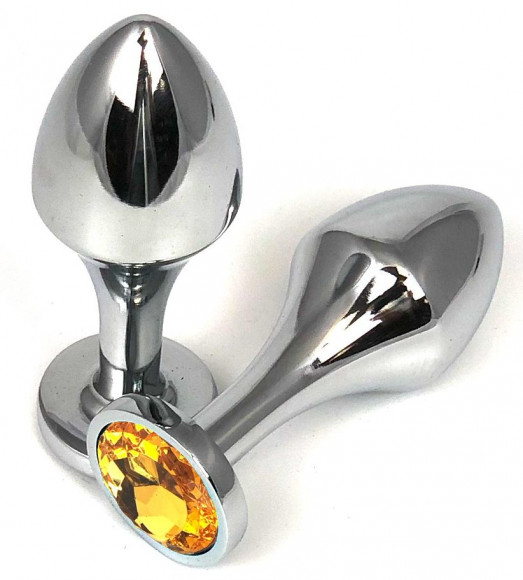 Серебристая анальная пробка на удлиненной ножке с оранжевым кристаллом - 8 см. Серебристая анальная пробка на удлиненной ножке с оранжевым кристаллом - 8 см.